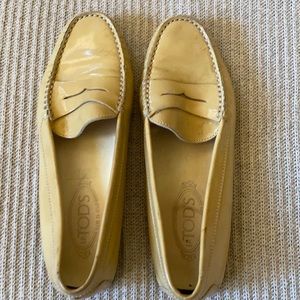 Tod’s Creme Patent Leather penny driving loafer